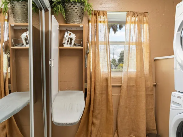 Laundry room with built in ironing board