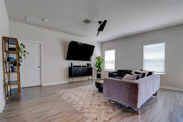Living Room with Door Entry to Primary Bedroom