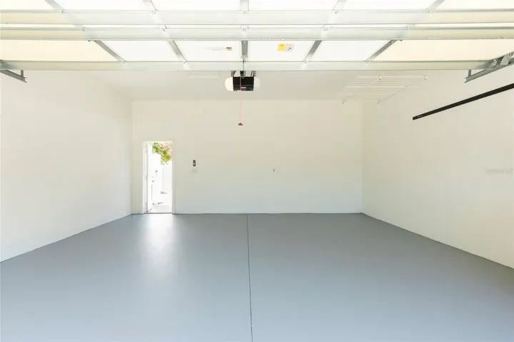 2 Car Garage with ceiling mounted storage racks.