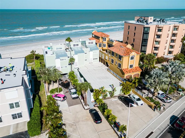 Small complex on the west side of Gulf Blvd. Ground level condo just steps to the sand, with assigned parking for TWO vehicles!