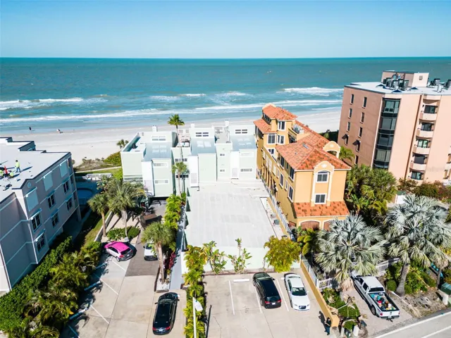 Small complex on the west side of Gulf Blvd with assigned parking. Unit 1A is one of the four ground floor units in front of the two story part of the building, closest to Gulf Blvd.