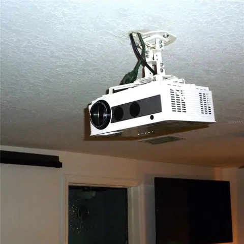 Your TV/Movie Projector is conveniently mounted overhead and out of the way