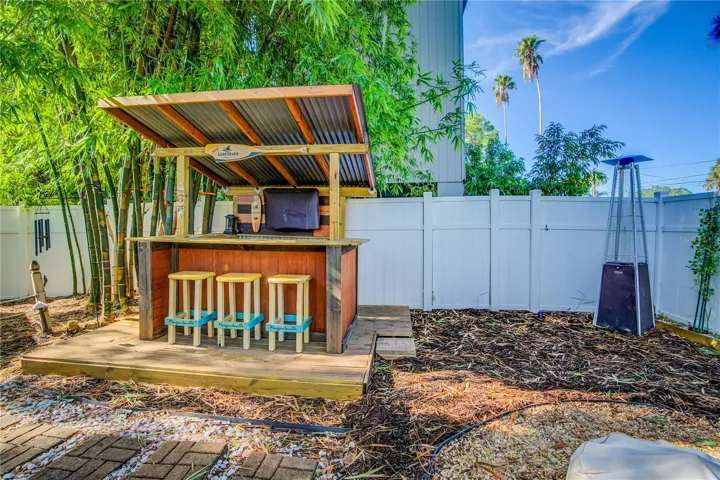 This fenced, private area of the side yard offers lots of possibilities