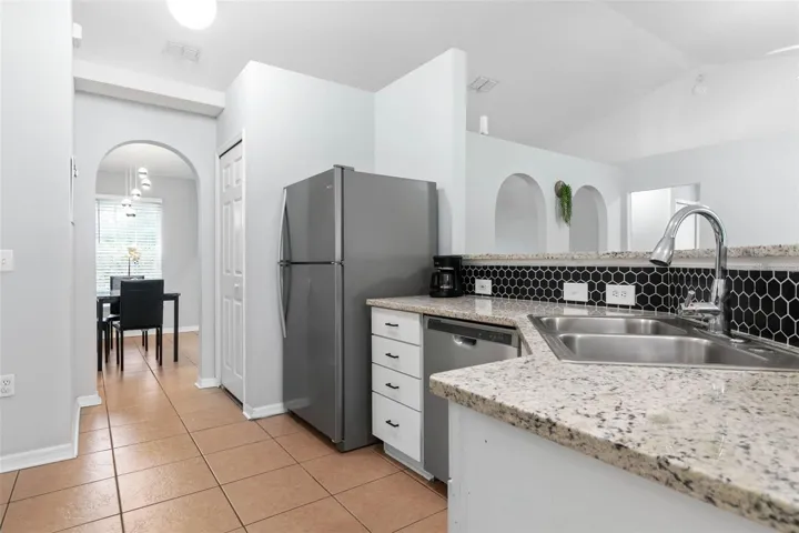 Kitchen with new granite counter tops