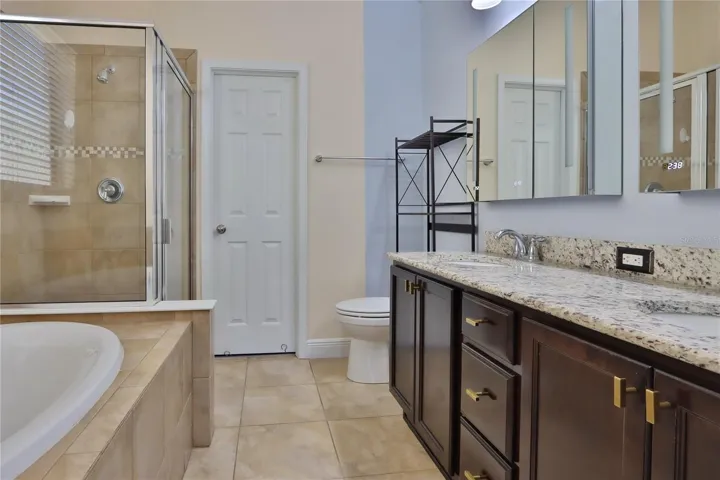 Lavish soaking tub & separate walk-in shower.