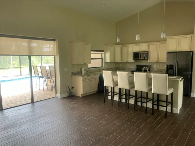GREAT ROOM KITCHEN POOL VIEW