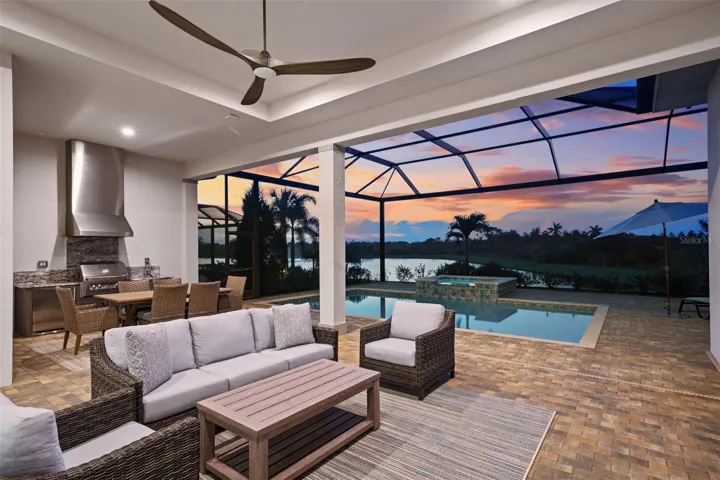 Outdoor kitchen and seating area (sunset)
