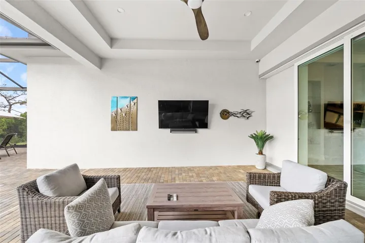 T.V., ceiling fan and in-ceiling speakers