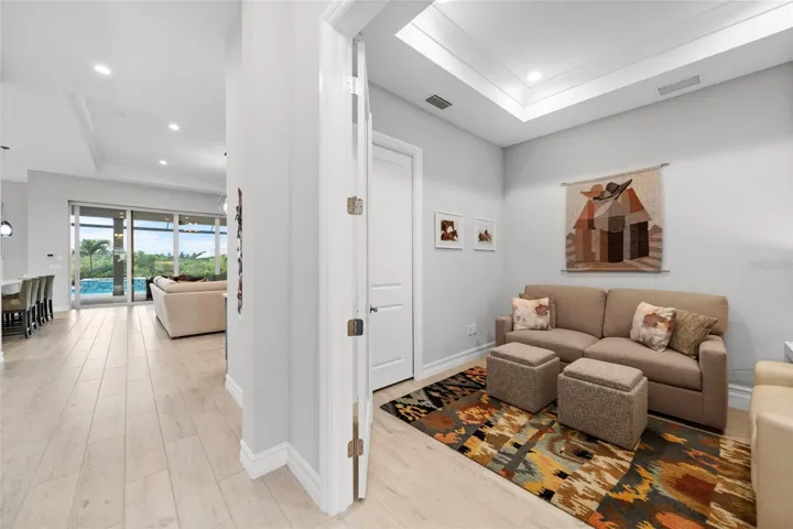 Reading Room / Den with glass French doors upon entering