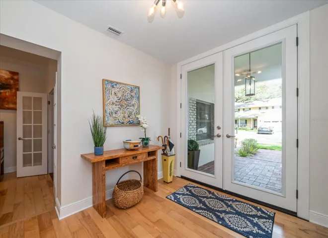 Foyer entry leading to open family room and office/living room!