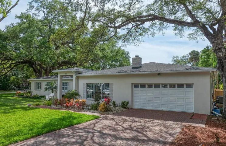 Brick paver driveway and two car garage!