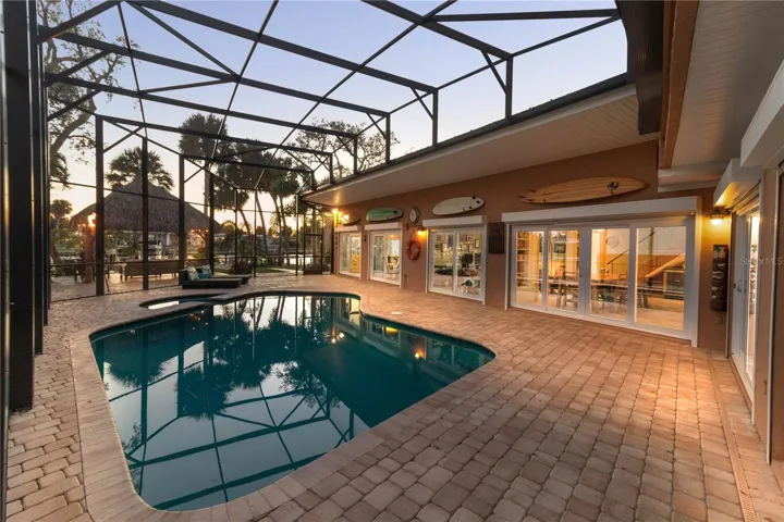 Night View of the pool with lights throughout.