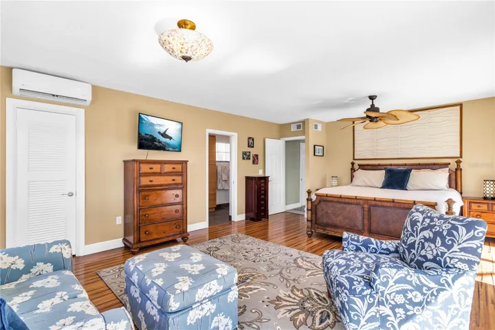 Master bedroom suite features a sitting area.