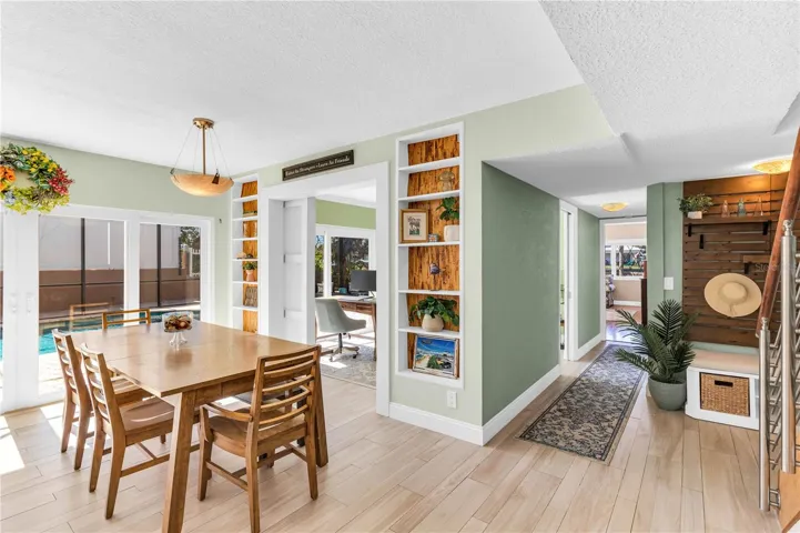 Dinning area into hallway towards the office and master bedroom suite in the first floor.