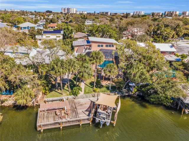 Dock with boat slip and lift .