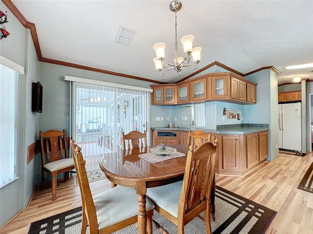 The dining room has sliding doors opening to the front porch
