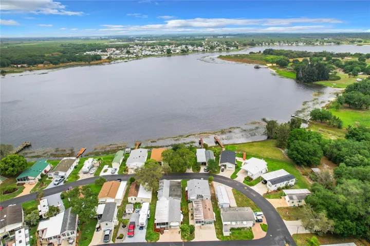 Aerial view of the home and Saddlebag lake behind it