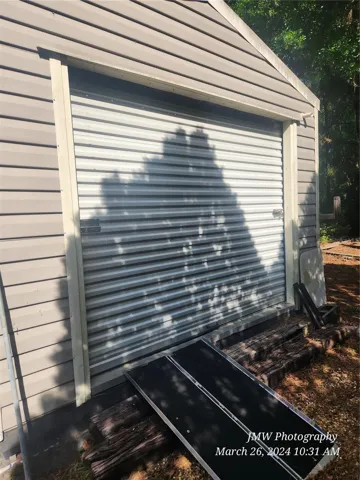 ROLL DOOR TO WORKSHOP