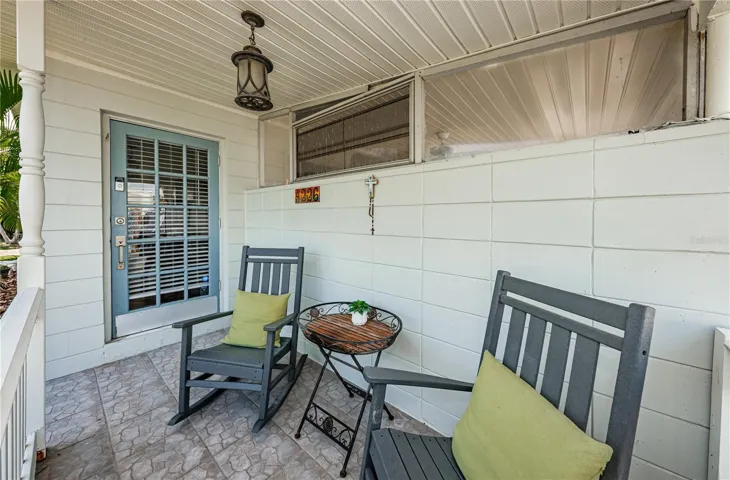 Enjoy your morning coffee on the lovely front porch.