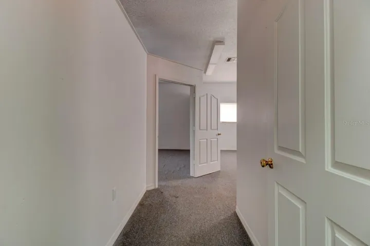 Hallway leading to the upstairs storage Units