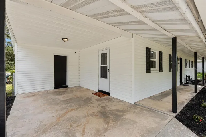 Carport and door to Laundry Room