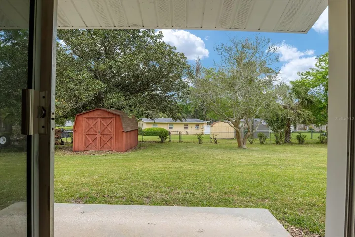 View of backyard from sliding glass doors