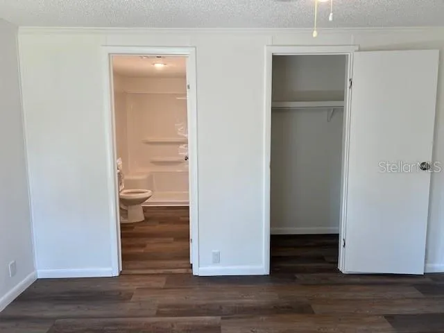 master bedroom closet and bathroom