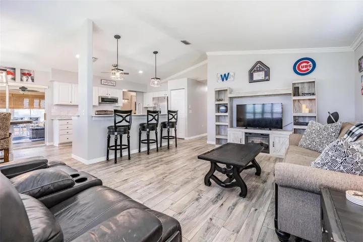 Family room with views of the kitchen and lanai