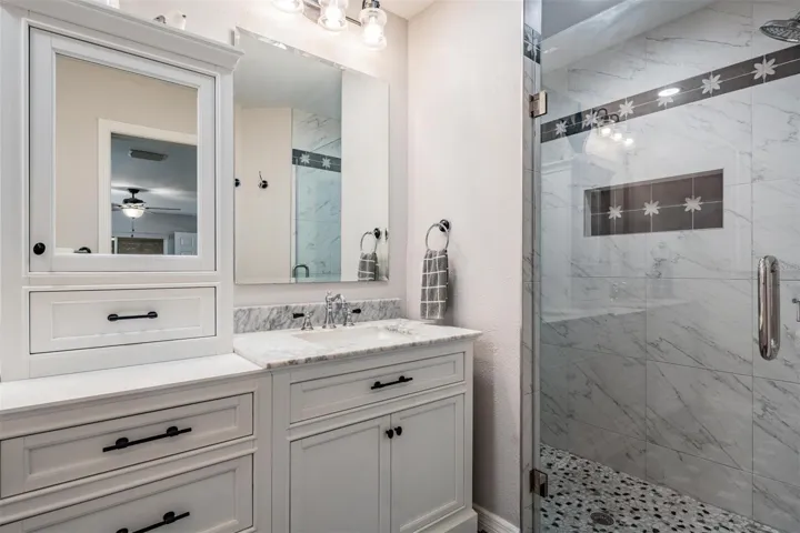 Designer vanity and walk-in shower