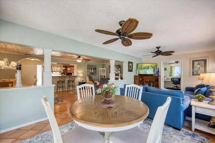 Terracotta diagonal tiles & dual fans in family room~