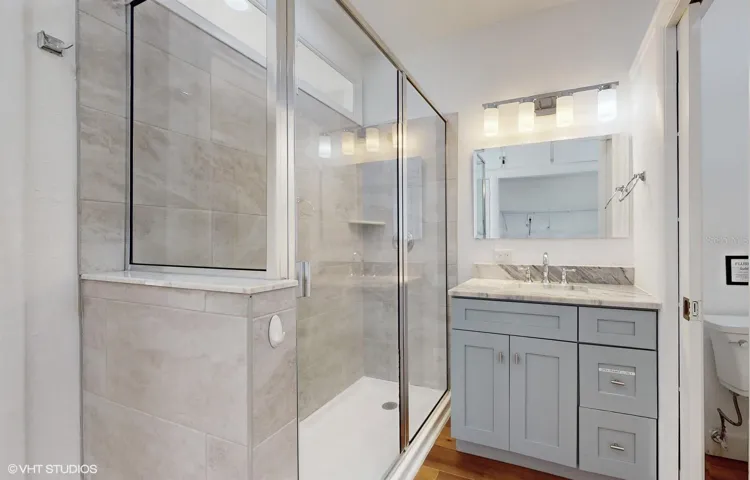 Updated Vanity and Glass Enclosed Shower