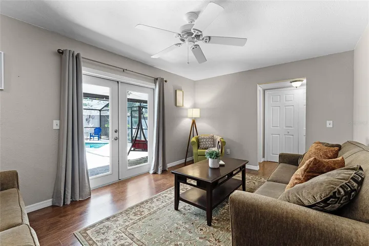 French Doors (with dual pane/impact glass) leads to the lanai, pool & backyard