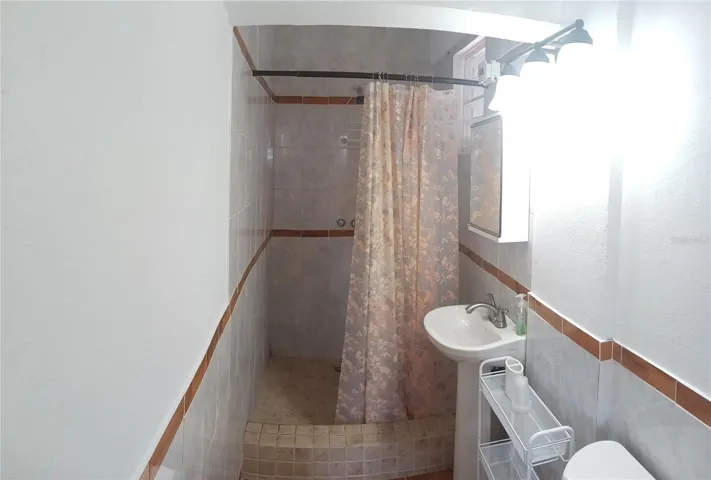 LOWER LEVEL 1B/1B BATHROOM VIEW