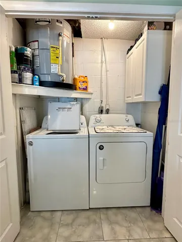 Laundry closet in master bedroom