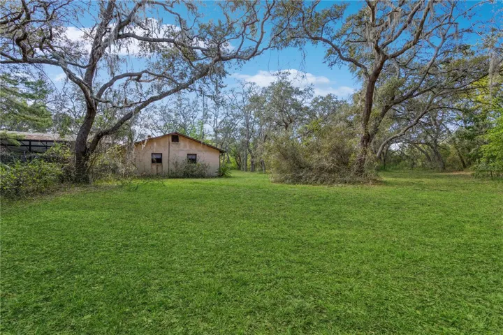 2.5 Wooded Acres with screened pool