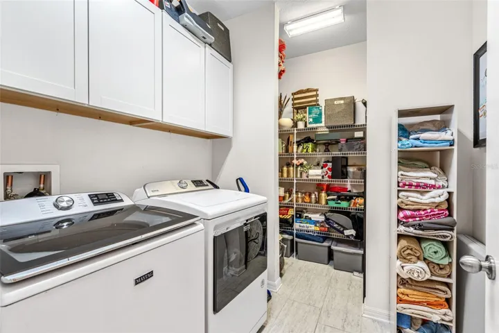 Interior laundry room with extra storage