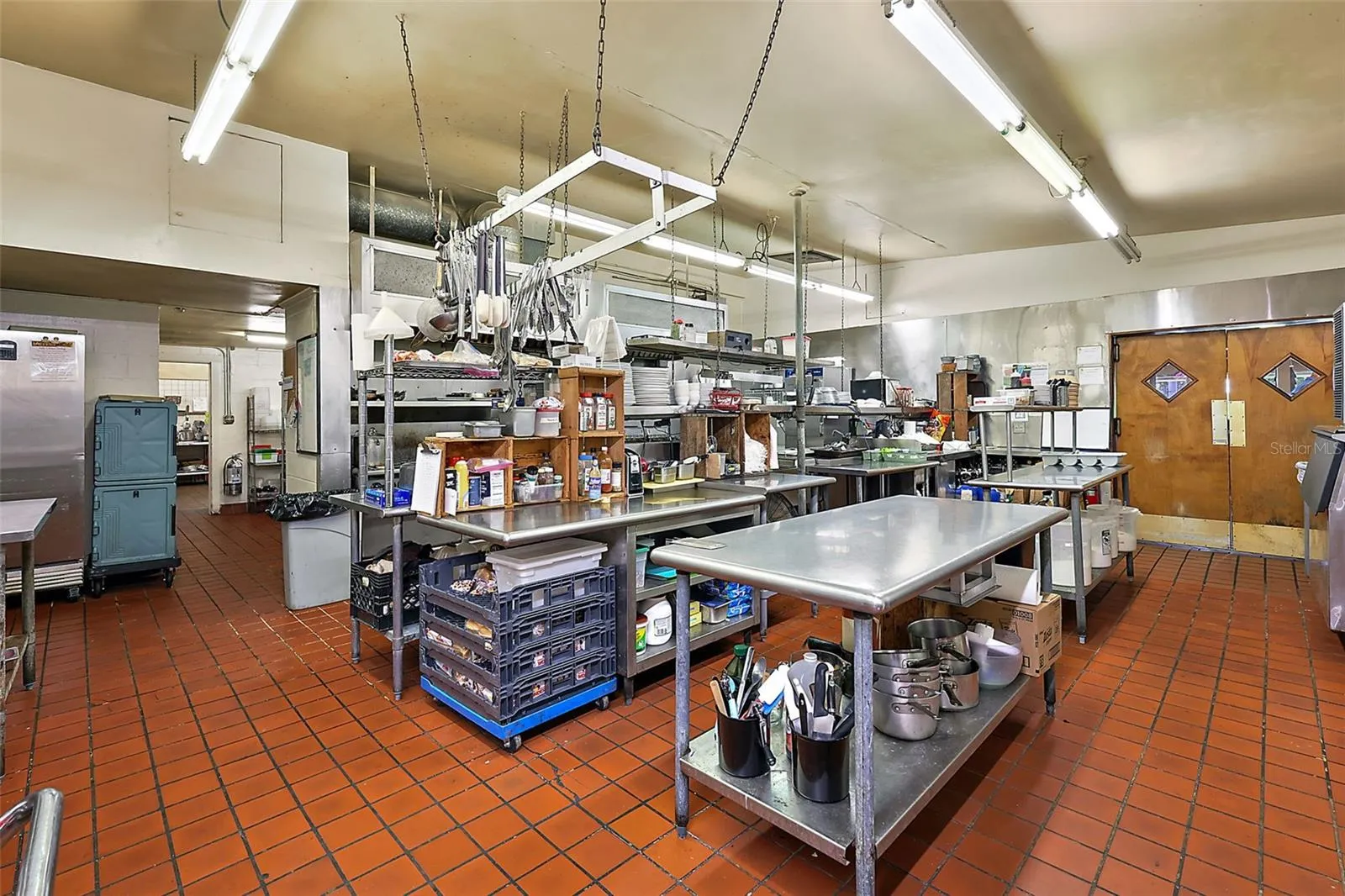 Wide shot of cooking area and entrance to dinning area