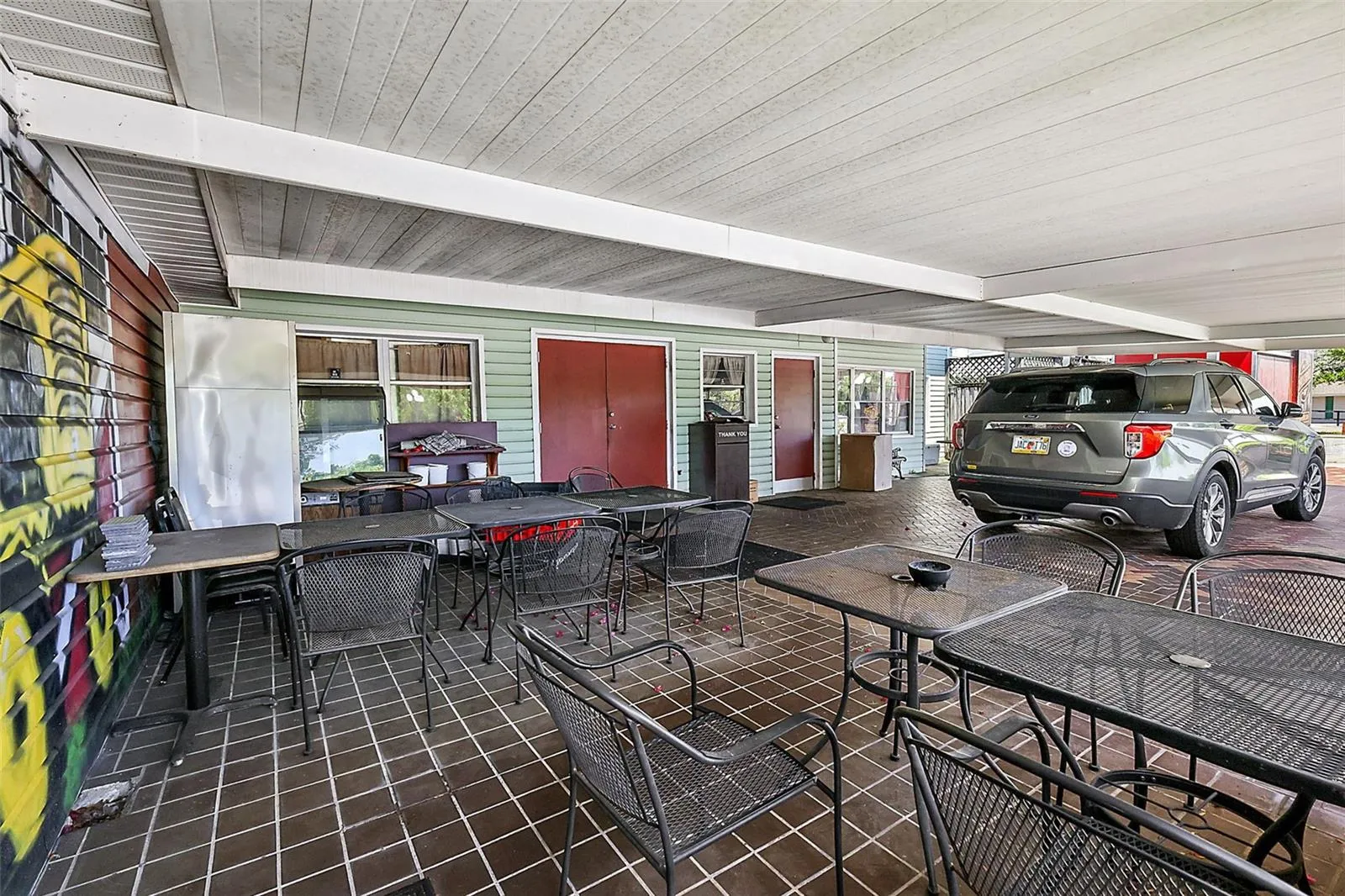 outdoor seating area and covered parking