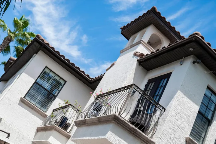 PRIMARY SUITE BALCONIES OVERLOOKING POOL AND TERRACE!