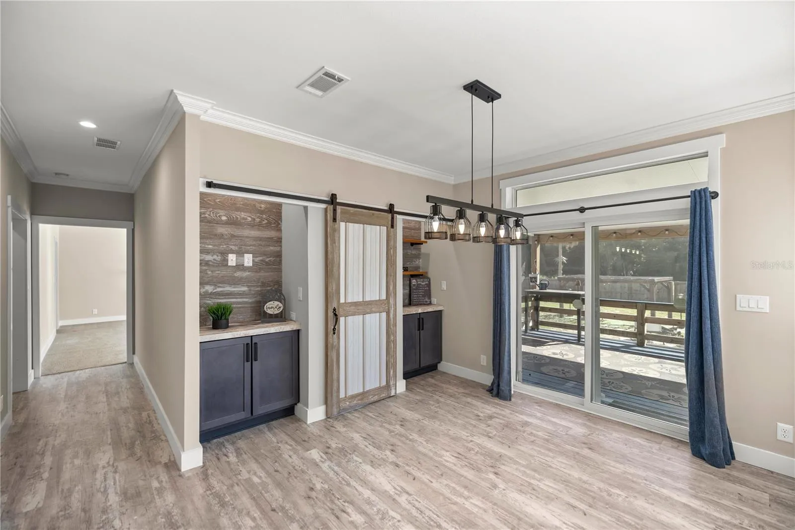 Dining Area with Builds ins---and door to secret room.