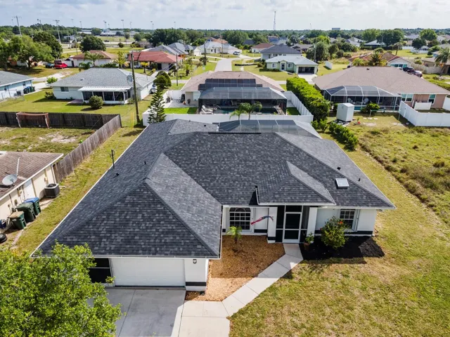 Welcome Home. New roof, recently painted trim, extended driveway.