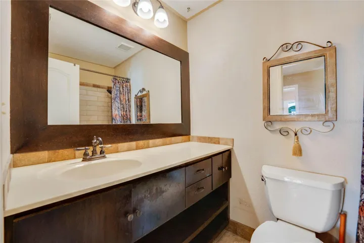 2nd Bathroom has shower and large vanity