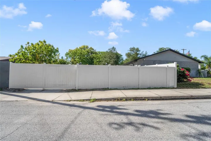 Corner lot--can drive through large gate with trailers/boats/etc