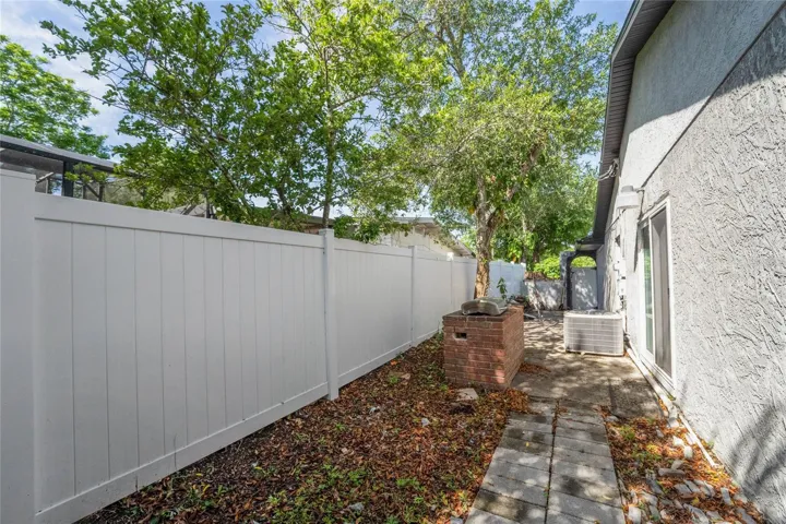 Side yard off breakfast nook has it's own patio