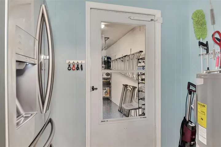 Entry Way from Garage w/ Extra Refrigerator