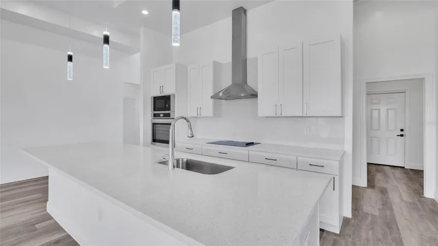 Kitchen with quartz oversized island