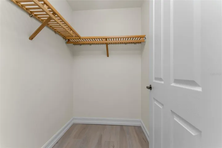 Master  Walk in Closet Wood Closet Shelves