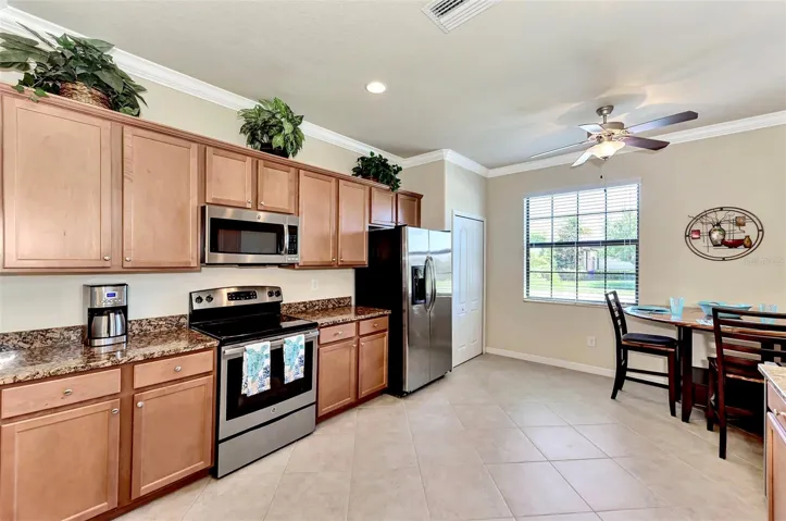 Maple Wood Cabinetry, Granite Counters, Stainless Appliances