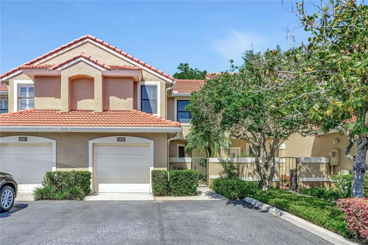 Beautifully Styled Townhomes with New Tile Roof.