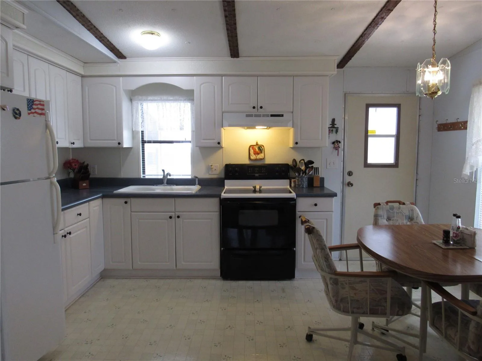 Eat-in Kitchen with cathedral ceiling.